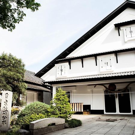 ゲストハウス酒坊多満自慢 Fussa Buitenkant foto