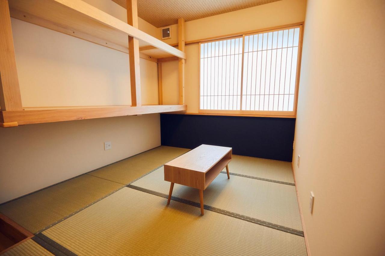 ゲストハウス酒坊多満自慢 Fussa Buitenkant foto