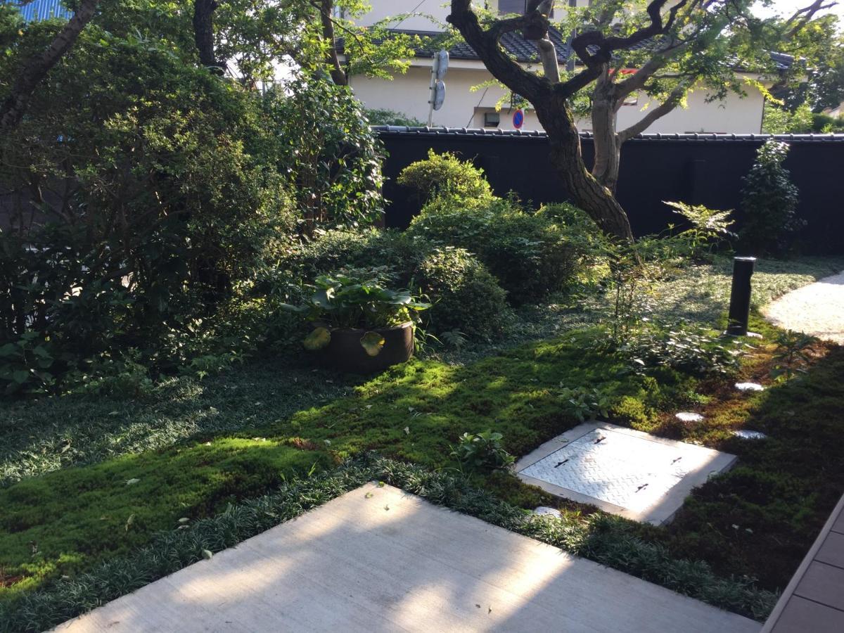 ゲストハウス酒坊多満自慢 Fussa Buitenkant foto